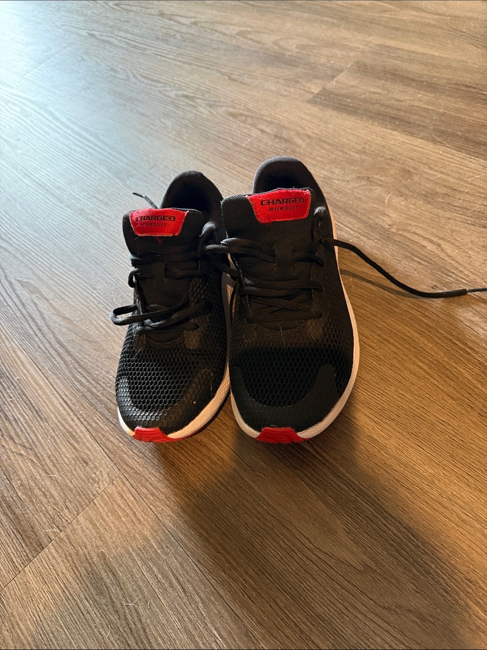 Under Armour Kids Black and Red Charged Running Sneakers